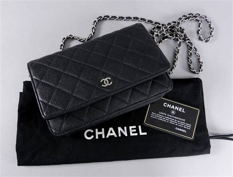 black chanel wallet with white logo|Chanel black wallet with chain.